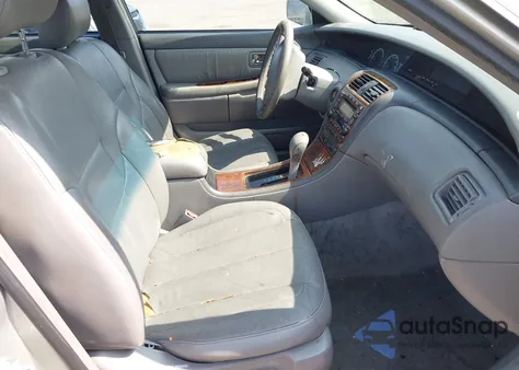 2000 Toyota Avalon Xls z USA, uszkodzony, nr VIN 4T1BF28B4YU083666